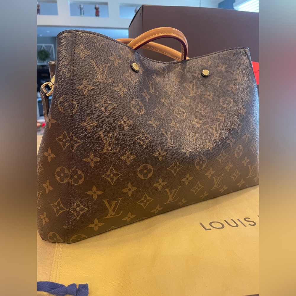 Authentic Louis Vuitton Montagine Mono GM.  Retired bag good condition!